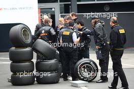 23.07.2011 Nurburgring, Germany,  McLaren engineers with Perelli tyres - Formula 1 World Championship, Rd 10, German Grand Prix, Saturday