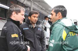 23.07.2011 Nurburgring, Germany,  Narain Karthikeyan (IND), HRT Formula One Team and Karun Chandhok (IND), Lotus F1 Team - Formula 1 World Championship, Rd 10, German Grand Prix, Saturday