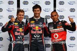 23.07.2011 Nurburgring, Germany,  Mark Webber (AUS), Red Bull Racing gets pole position, Sebastian Vettel (GER), Red Bull Racing 3rd and Lewis Hamilton (GBR), McLaren Mercedes 2nd - Formula 1 World Championship, Rd 10, German Grand Prix, Saturday Qualifying
