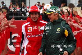 24.07.2011 Nurburgring, Germany,  Fernando Alonso (ESP), Scuderia Ferrari, Heikki Kovalainen (FIN), Team Lotus - Formula 1 World Championship, Rd 10, German Grand Prix, Sunday