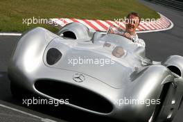 21.07.2011 , Germany,  Michael Schumacher (GER), Mercedes GP drives the 1956 Mercedes W196s   - Formula 1 World Championship, Rd 10, German Grand Prix, Thursday