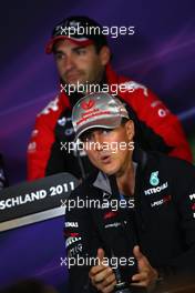 21.07.2011 , Germany,  Michael Schumacher (GER), Mercedes GP Petronas F1 Team, Timo Glock (GER), Marussia Virgin Racing - Formula 1 World Championship, Rd 10, German Grand Prix, Thursday Press Conference
