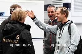21.07.2011 , Germany,  Nick Heidfeld (GER), Lotus Renault GP, Sebastian Vettel (GER), Red Bull Racing - Formula 1 World Championship, Rd 10, German Grand Prix, Thursday