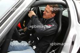 21.07.2011 , Germany,  Michael Schumacher (GER), Mercedes GP drives a Mercedes SLS - Formula 1 World Championship, Rd 10, German Grand Prix, Thursday