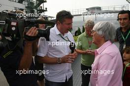 29.07.2011 Budapest, Hungary,  Bernie Ecclestone (GBR) with the BBC - Formula 1 World Championship, Rd 11, Hungarian Grand Prix, Friday