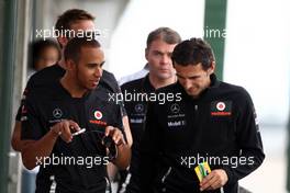 29.07.2011 Budapest, Hungary,  Lewis Hamilton (GBR), McLaren Mercedes with Pedro De La Rosa (ESP) - Formula 1 World Championship, Rd 11, Hungarian Grand Prix, Friday