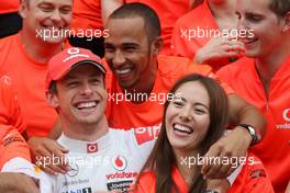 31.07.2011 Budapest, Hungary,  John Button (GBR) Father of Jenson, Nicholas Hamilton (GBR), Brother of Lewis Hamilton, McLaren Mercedes, Lewis Hamilton (GBR), McLaren Mercedes, Jenson Button (GBR), McLaren Mercedes, Jessica Michibata (JPN) girlfriend of Jenson Button (GBR) celebrate with the team - Formula 1 World Championship, Rd 11, Hungarian Grand Prix, Sunday Podium