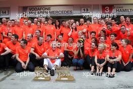 31.07.2011 Budapest, Hungary,  John Button (GBR) Father of Jenson, Nicholas Hamilton (GBR), Brother of Lewis Hamilton, McLaren Mercedes, Lewis Hamilton (GBR), McLaren Mercedes, Jessica Michibata (JPN) girlfriend of Jenson Button (GBR) celebrate with the team - Formula 1 World Championship, Rd 11, Hungarian Grand Prix, Sunday Podium