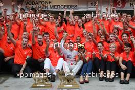 31.07.2011 Budapest, Hungary,  John Button (GBR) Father of Jenson, Nicholas Hamilton (GBR), Brother of Lewis Hamilton, McLaren Mercedes, Lewis Hamilton (GBR), McLaren Mercedes, Jenson Button (GBR), McLaren Mercedes, Jessica Michibata (JPN) girlfriend of Jenson Button (GBR) celebrate with the team - Formula 1 World Championship, Rd 11, Hungarian Grand Prix, Sunday Podium