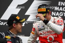 31.07.2011 Budapest, Hungary,  Jenson Button (GBR), McLaren Mercedes, Sebastian Vettel (GER), Red Bull Racing- Formula 1 World Championship, Rd 11, Hungarian Grand Prix, Sunday Podium