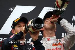 31.07.2011 Budapest, Hungary,  Sebastian Vettel (GER), Red Bull Racing, Jenson Button (GBR), McLaren Mercedes - Formula 1 World Championship, Rd 11, Hungarian Grand Prix, Sunday Podium