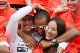 31.07.2011 Budapest, Hungary,  Lewis Hamilton (GBR), McLaren Mercedes, Jenson Button (GBR), McLaren Mercedes, Jessica Michibata (JPN) girlfriend of Jenson Button (GBR) celebrate with the team - Formula 1 World Championship, Rd 11, Hungarian Grand Prix, Sunday Podium