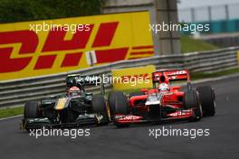 31.07.2011 Budapest, Hungary,  Jarno Trulli (ITA), Team Lotus and Timo Glock (GER), Marussia Virgin Racing - Formula 1 World Championship, Rd 11, Hungarian Grand Prix, Sunday Race