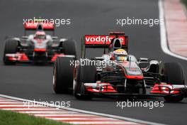 31.07.2011 Budapest, Hungary,  Lewis Hamilton (GBR), McLaren Mercedes, Jenson Button (GBR), McLaren Mercedes - Formula 1 World Championship, Rd 11, Hungarian Grand Prix, Sunday Race