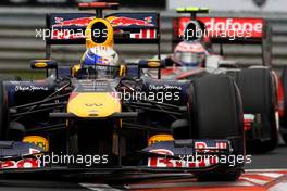 31.07.2011 Budapest, Hungary,  Sebastian Vettel (GER), Red Bull Racing leads Jenson Button (GBR), McLaren Mercedes - Formula 1 World Championship, Rd 11, Hungarian Grand Prix, Sunday Race