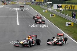 31.07.2011 Budapest, Hungary,  Sebastian Vettel (GER), Red Bull Racing and Jenson Button (GBR), McLaren Mercedes  - Formula 1 World Championship, Rd 11, Hungarian Grand Prix, Sunday Race