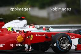 31.07.2011 Budapest, Hungary,  Felipe Massa (BRA), Scuderia Ferrari and Michael Schumacher (GER), Mercedes GP Petronas F1 Team - Formula 1 World Championship, Rd 11, Hungarian Grand Prix, Sunday Race