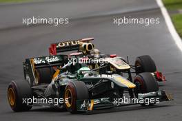 31.07.2011 Budapest, Hungary,  Heikki Kovalainen (FIN), Team Lotus leads Nick Heidfeld (GER), Lotus Renault GP - Formula 1 World Championship, Rd 11, Hungarian Grand Prix, Sunday Race