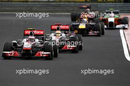 31.07.2011 Budapest, Hungary,  Jenson Button (GBR), McLaren Mercedes leads Lewis Hamilton (GBR), McLaren Mercedes - Formula 1 World Championship, Rd 11, Hungarian Grand Prix, Sunday Race