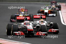 31.07.2011 Budapest, Hungary,  Jenson Button (GBR), McLaren Mercedes, Lewis Hamilton (GBR), McLaren Mercedes - Formula 1 World Championship, Rd 11, Hungarian Grand Prix, Sunday Race