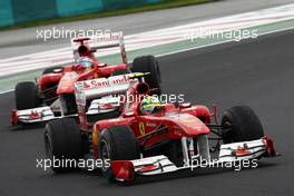 31.07.2011 Budapest, Hungary,  Felipe Massa (BRA), Scuderia Ferrari leads Fernando Alonso (ESP), Scuderia Ferrari - Formula 1 World Championship, Rd 11, Hungarian Grand Prix, Sunday Race