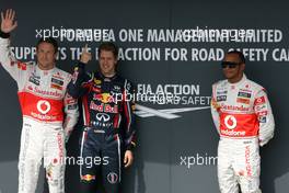 30.07.2011 Budapest, Hungary,  Jenson Button (GBR), McLaren Mercedes, Sebastian Vettel (GER), Red Bull Racing and Lewis Hamilton (GBR), McLaren Mercedes - Formula 1 World Championship, Rd 11, Hungarian Grand Prix, Saturday Qualifying