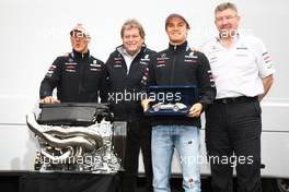 30.07.2011 Budapest, Hungary,  Nico Rosberg (GER), Mercedes GP Petronas F1 Team celebrates his 100th race with Michael Schumacher (GER), Mercedes GP Petronas F1 Team, Ross Brawn (GBR) Team Principal, Mercedes GP Petronas and Norbert Haug (GER), Mercedes, Motorsport chief  - Formula 1 World Championship, Rd 11, Hungarian Grand Prix, Saturday