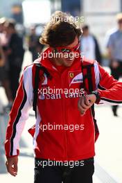 30.07.2011 Budapest, Hungary,  Fernando Alonso (ESP), Scuderia Ferrari looks at his watch - Formula 1 World Championship, Rd 11, Hungarian Grand Prix, Saturday