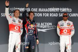 30.07.2011 Budapest, Hungary,  Jenson Button (GBR), McLaren Mercedes, Sebastian Vettel (GER), Red Bull Racing, Lewis Hamilton (GBR), McLaren Mercedes - Formula 1 World Championship, Rd 11, Hungarian Grand Prix, Saturday Qualifying