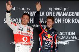 30.07.2011 Budapest, Hungary,  Jenson Button (GBR), McLaren Mercedes, Sebastian Vettel (GER), Red Bull Racing - Formula 1 World Championship, Rd 11, Hungarian Grand Prix, Saturday Qualifying