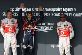 30.07.2011 Budapest, Hungary,  Jenson Button (GBR), McLaren Mercedes, Sebastian Vettel (GER), Red Bull Racing and Lewis Hamilton (GBR), McLaren Mercedes  - Formula 1 World Championship, Rd 11, Hungarian Grand Prix, Saturday Qualifying