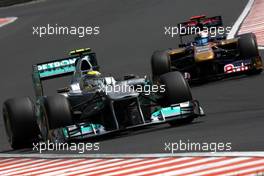 30.07.2011 Budapest, Hungary,  Nico Rosberg (GER), Mercedes GP Petronas F1 Team, Sébastien Buemi (SUI), Scuderia Toro Rosso - Formula 1 World Championship, Rd 11, Hungarian Grand Prix, Saturday Practice