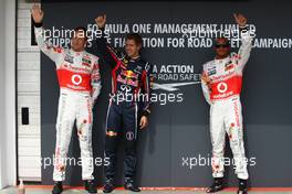 30.07.2011 Budapest, Hungary,  Jenson Button (GBR), McLaren Mercedes with Sebastian Vettel (GER), Red Bull Racing and  Lewis Hamilton (GBR), McLaren Mercedes and - Formula 1 World Championship, Rd 11, Hungarian Grand Prix, Saturday Qualifying