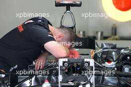 28.07.2011 Budapest, Hungary, McLaren Mercedes mechanic - Formula 1 World Championship, Rd 11, Hungarian Grand Prix, Thursday