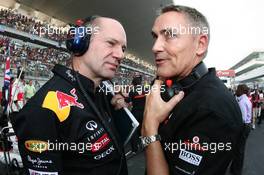 30.10.2011 New Delhi, India, Adrian Newey (GBR), Red Bull Racing, Technical Operations Director and Martin Whitmarsh (GBR), McLaren, Chief Executive Officer  - Formula 1 World Championship, Rd 17, Indian Grand Prix, Sunday Pre-Race Grid