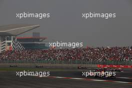 30.10.2011 New Delhi, India, Sebastian Vettel (GER), Red Bull Racing leads the start of the race  - Formula 1 World Championship, Rd 17, Indian Grand Prix, Sunday Podium
