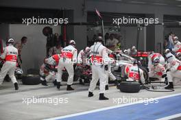 30.10.2011 New Delhi, India, Lewis Hamilton (GBR), McLaren Mercedes pit stop and gets a new front wing  - Formula 1 World Championship, Rd 17, Indian Grand Prix, Sunday Race
