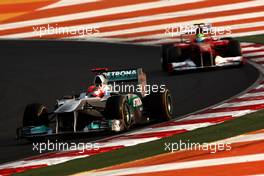 30.10.2011 New Delhi, India, Michael Schumacher (GER), Mercedes GP Petronas F1 Team leads Felipe Massa (BRA), Scuderia Ferrari - Formula 1 World Championship, Rd 17, Indian Grand Prix, Sunday Race