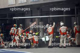 30.10.2011 New Delhi, India, Adrian Sutil (GER), Force India F1 Team  pit stop  - Formula 1 World Championship, Rd 17, Indian Grand Prix, Sunday Race