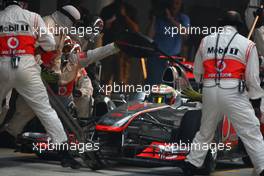 30.10.2011 New Delhi, India, Lewis Hamilton (GBR), McLaren Mercedes pit stop  - Formula 1 World Championship, Rd 17, Indian Grand Prix, Sunday Race