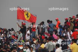 29.10.2011 New Delhi, India, Ferrari fans and flag  - Formula 1 World Championship, Rd 17, Indian Grand Prix, Saturday Practice