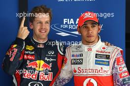 29.10.2011 New Delhi, India, pole man Sebastian Vettel (GER), Red Bull Racing with Lewis Hamilton (GBR), McLaren Mercedes  - Formula 1 World Championship, Rd 17, Indian Grand Prix, Saturday Qualifying