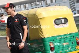 27.10.2011 New Delhi, India, Jenson Button (GBR), McLaren Mercedes in a Rickshaw - Formula 1 World Championship, Rd 17, Indian Grand Prix, Thursday