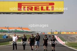 27.10.2011 New Delhi, India, Vitaly Petrov (RUS), Lotus Renault GP walks the track - Formula 1 World Championship, Rd 17, Indian Grand Prix, Thursday