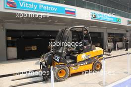 26.10.2011 New Delhi, India, Fork lift truck in the pit lane  - Formula 1 World Championship, Rd 17, Indian Grand Prix, Wednesday