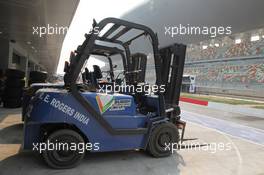 26.10.2011 New Delhi, India, Fork lift truck in the pit lane  - Formula 1 World Championship, Rd 17, Indian Grand Prix, Wednesday