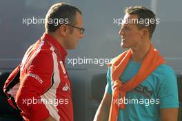 09.09.2011 Monza, Italy, Stefano Domenicali (ITA) Ferrari General Director and Michael Schumacher (GER), Mercedes GP Petronas F1 Team  - Formula 1 World Championship, Rd 13, Italian Grand Prix, Friday