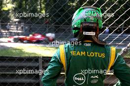 09.09.2011 Monza, Italy,  Heikki Kovalainen (FIN), Team Lotus watches the action after stopping on track - Formula 1 World Championship, Rd 13, Italian Grand Prix, Friday Practice