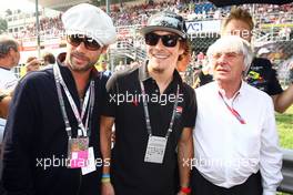 11.09.2011 Monza, Italy, Jay Kay (singer from the group Jamiroquai) wth Bernie Ecclestone (GBR) and Nicky Hayden (USA), MotoGP rider  - Formula 1 World Championship, Rd 13, Italian Grand Prix, Sunday Pre-Race Grid