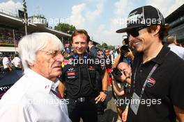11.09.2011 Monza, Italy, Bernie Ecclestone (GBR) with Nicky Hayden (USA), MotoGP rider and Christian Horner (GBR), Red Bull Racing, Sporting Director  - Formula 1 World Championship, Rd 13, Italian Grand Prix, Sunday Pre-Race Grid